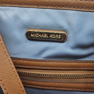 Michael Kors Men's Brown Leather Crossbody Bag with Light Blue Lining